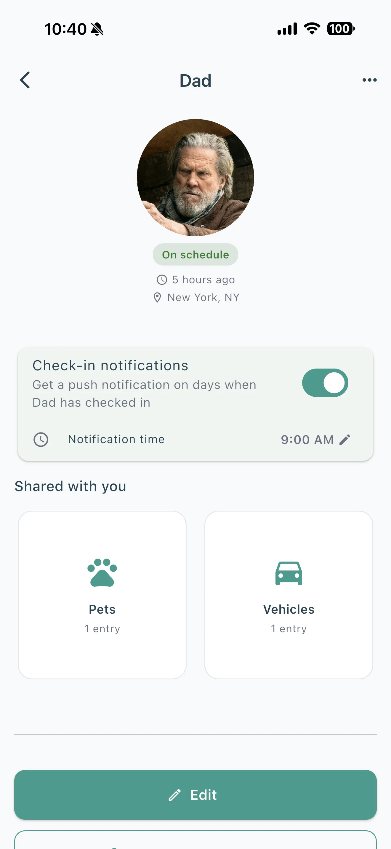 Contact detail view showing last check-in, city, shared vault sections, and a check-in notification toggle